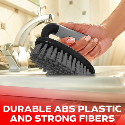 Wide power scrub brush cleaning a hard bathroom surface