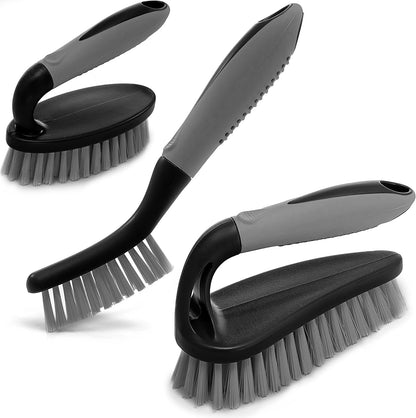 Three black ergonomic scrub brushes for broad surfaces corners and grout