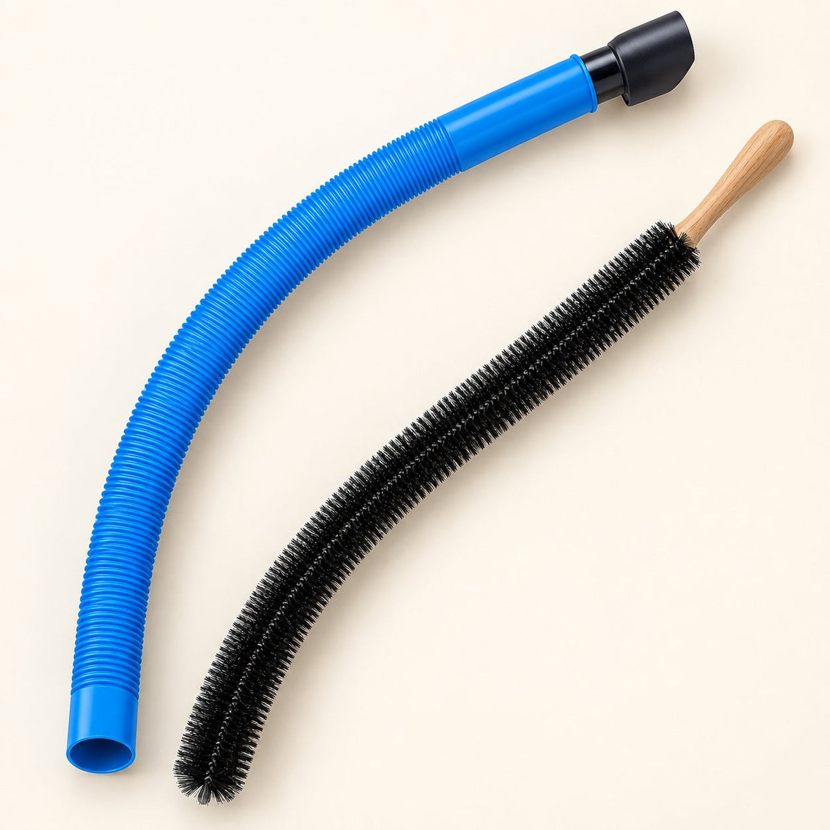 Flexible blue dryer vent vacuum hose and long black lint brush arranged on a warm ivory background